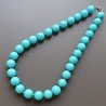 Collana girocollo resina turchese tondo liscio 14 mm annodato