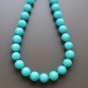 Collana girocollo resina turchese tondo liscio 14 mm annodato