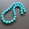Collana girocollo resina turchese tondo liscio 14 mm annodato