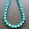 Collana girocollo resina turchese tondo liscio 12 mm annodato