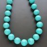 Collana girocollo resina turchese tondo liscio 16 mm annodato