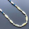 Collana giada limone ovale allungato liscio 10-11x28 mm e ovale 7mm annodato e pietre miste