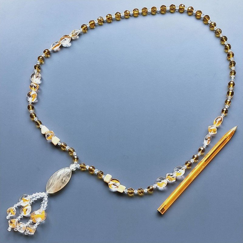 Collana cristallo ambra sferico sfac 8 mm con calcite infilato