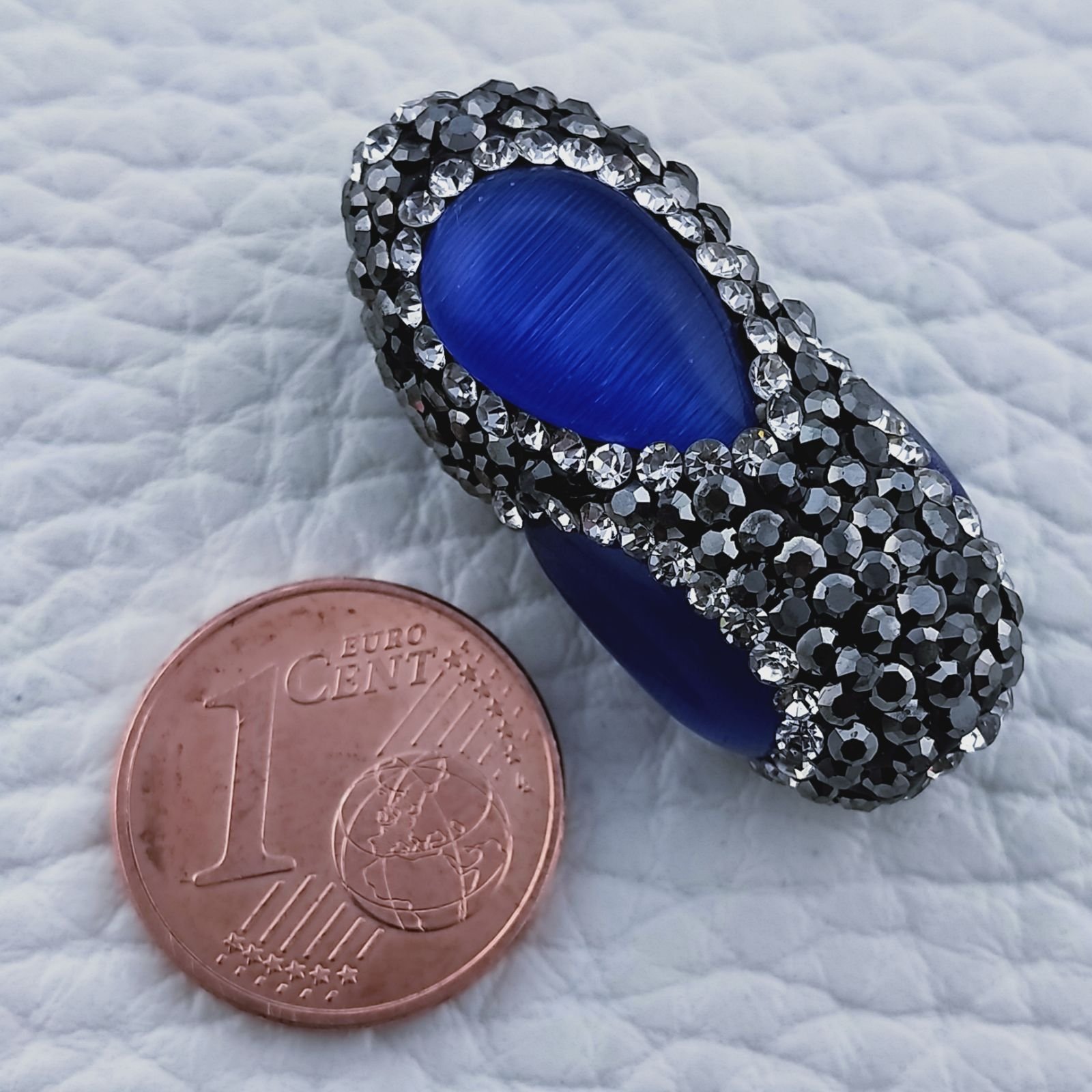 Marcasite Cilindro con occhio di gatto blu 15x28mm 1pz