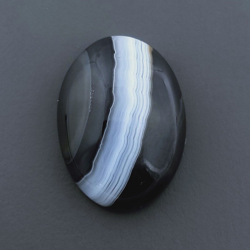 Onice Nera Naturale Striata Forma Ovale Piatto Cabochon Liscio Fatto a Mano 13X18X6mm 10,50 Carati 1pz Onice Nera Naturale Striata Forma Ovale Piatto Cabochon Liscio Fatto a Mano 13X18X6mm 10,50 Carati 1pz