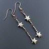 Orecchini A Nodo Orafo Dorato Con Ematite Dorato Forma Stella A Mano