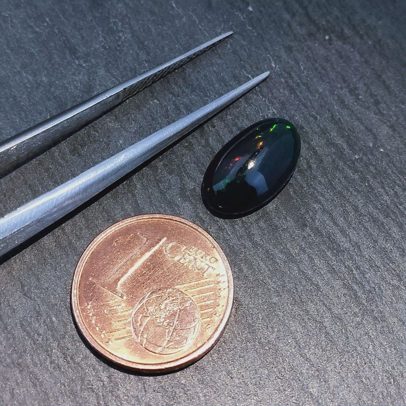 Opale Nero Welo Forma Ovale Cabochon Liscio A Mano 12X7X5mm 2,00 Carati 1pz Opale Nero Welo Forma Ovale Cabochon Liscio A Mano 12X7X5mm 2,00 Carati 1pz