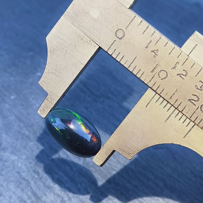 Opale Nero Welo Forma Ovale Cabochon Liscio A Mano 12X7X5mm 2,00 Carati 1pz Opale Nero Welo Forma Ovale Cabochon Liscio A Mano 12X7X5mm 2,00 Carati 1pz