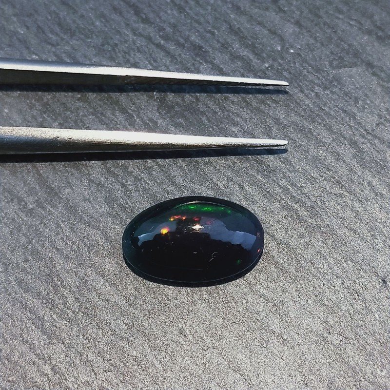 Opale Nero Welo Forma Ovale Cabochon Liscio A Mano 12X7X5mm 2,00 Carati 1pz Opale Nero Welo Forma Ovale Cabochon Liscio A Mano 12X7X5mm 2,00 Carati 1pz