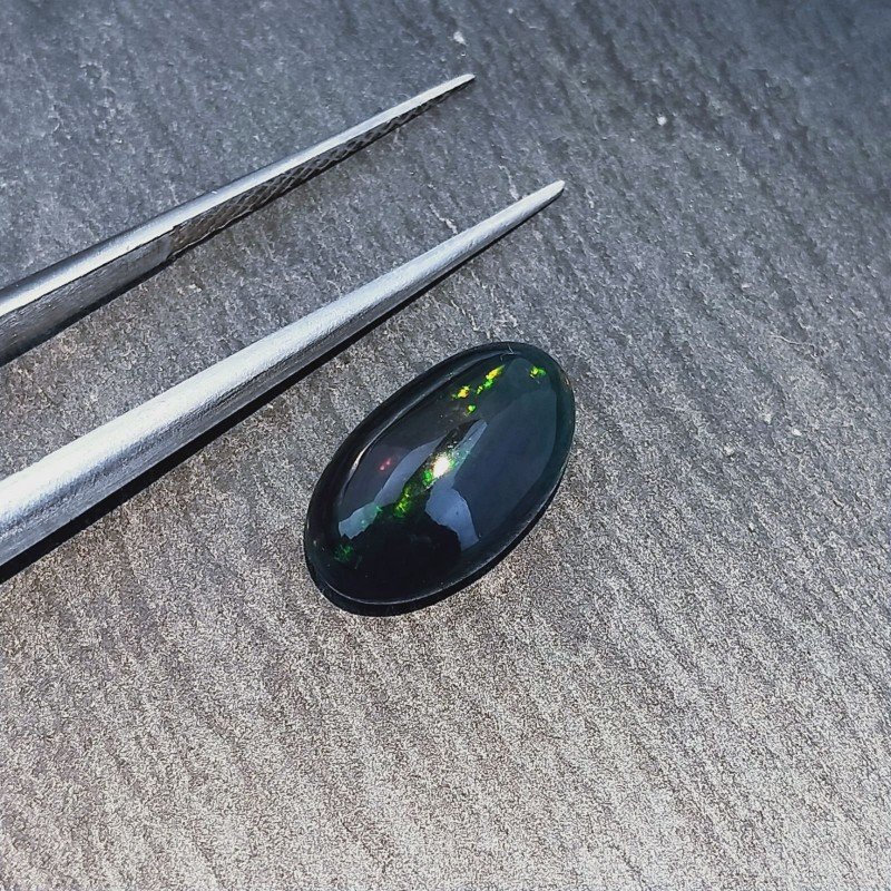 Opale Nero Welo Forma Ovale Cabochon Liscio A Mano 12X7X5mm 2,00 Carati 1pz Opale Nero Welo Forma Ovale Cabochon Liscio A Mano 12X7X5mm 2,00 Carati 1pz